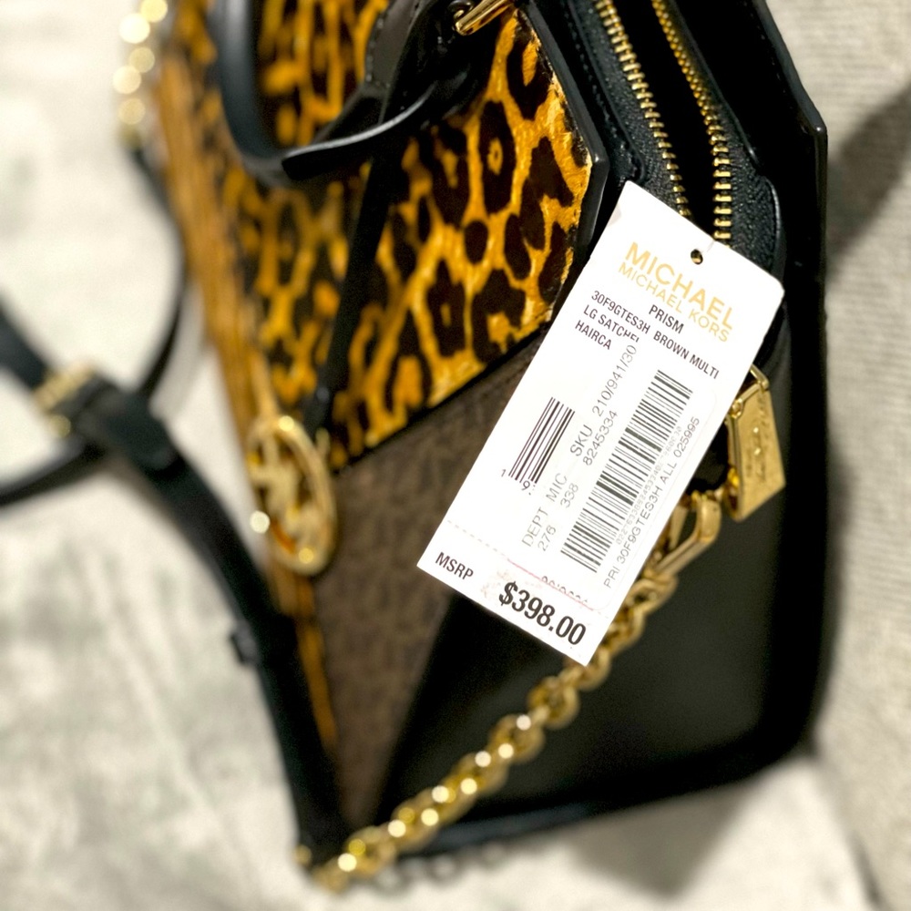Selling my Michael Kors animal print (hair calf)